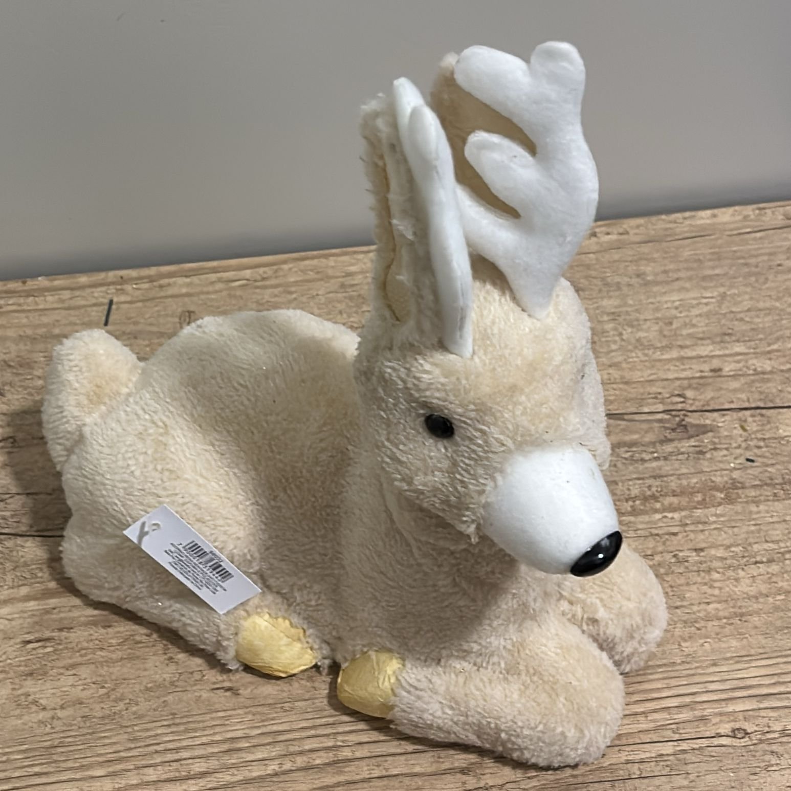 ADORNO RENA DEITADA 24X17X25CM BEGE